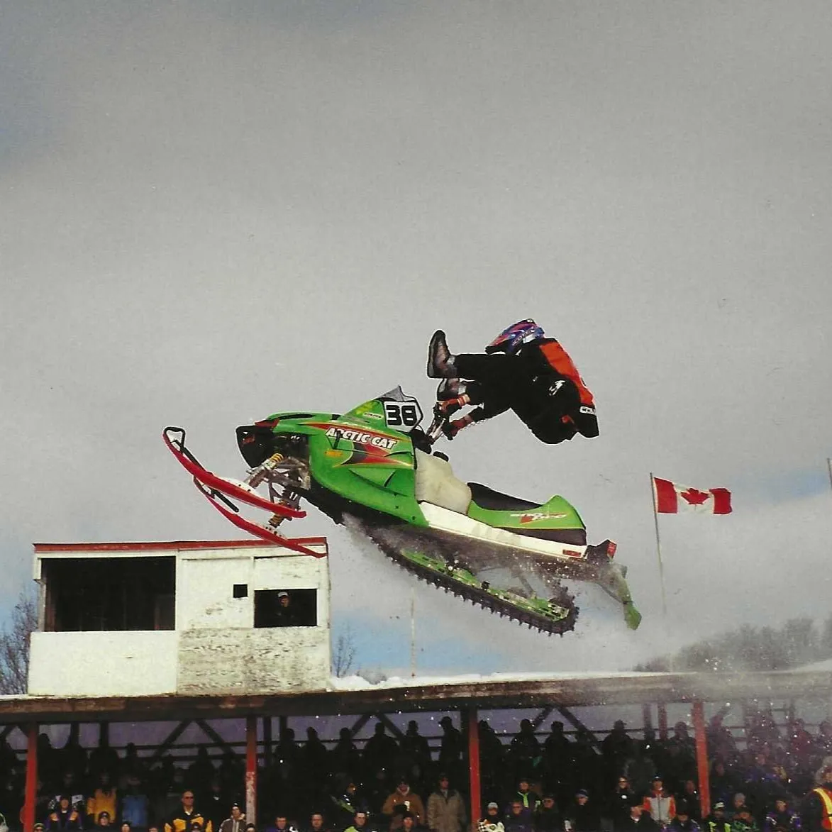 Childhood snowmobile or motocross photograph of Lee Stuart