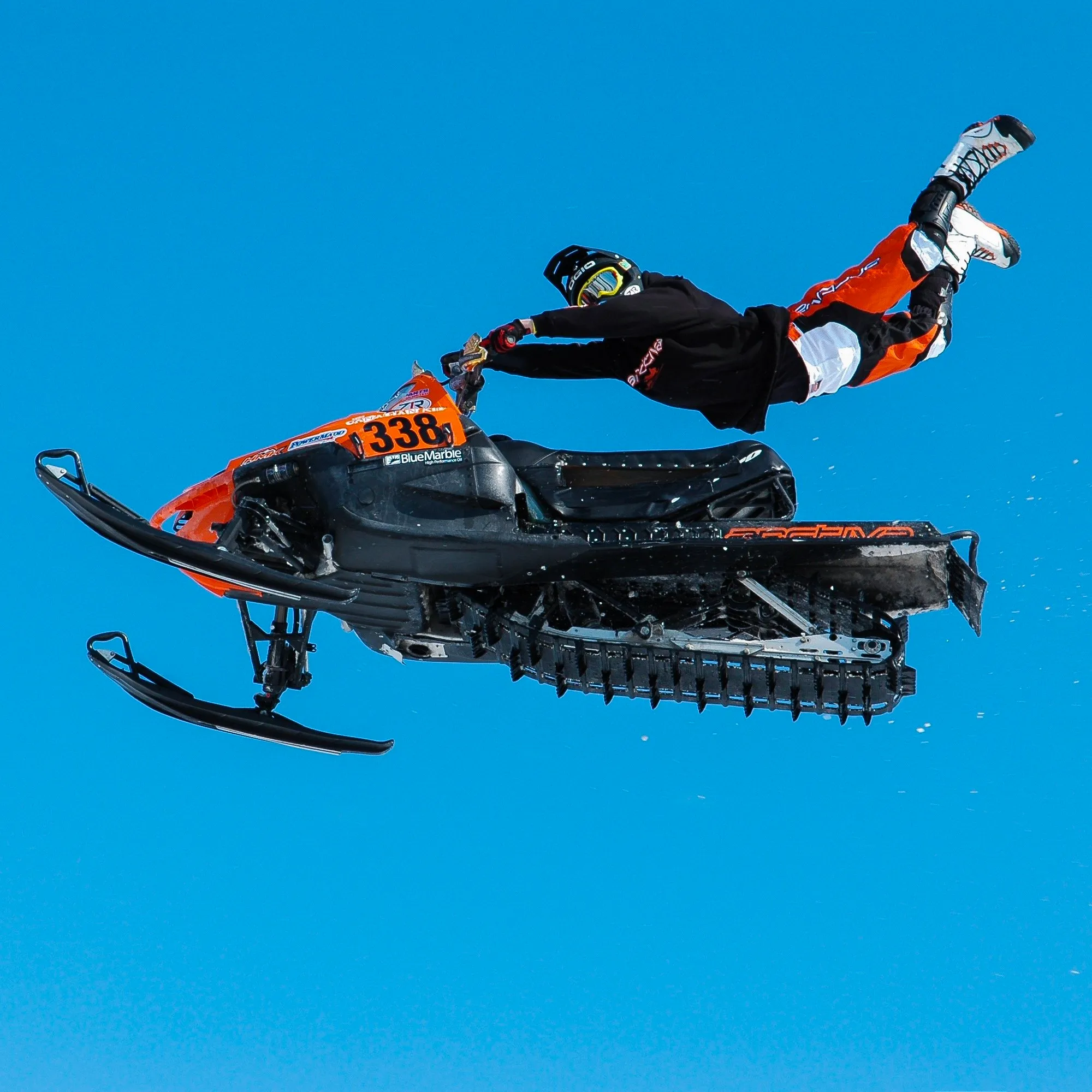 Lee Stuart racing a snowmobile at Selkirk